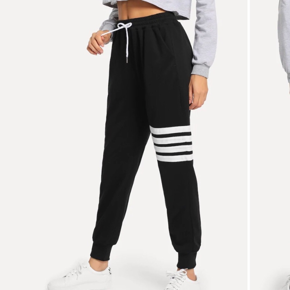 black joggers with white strips